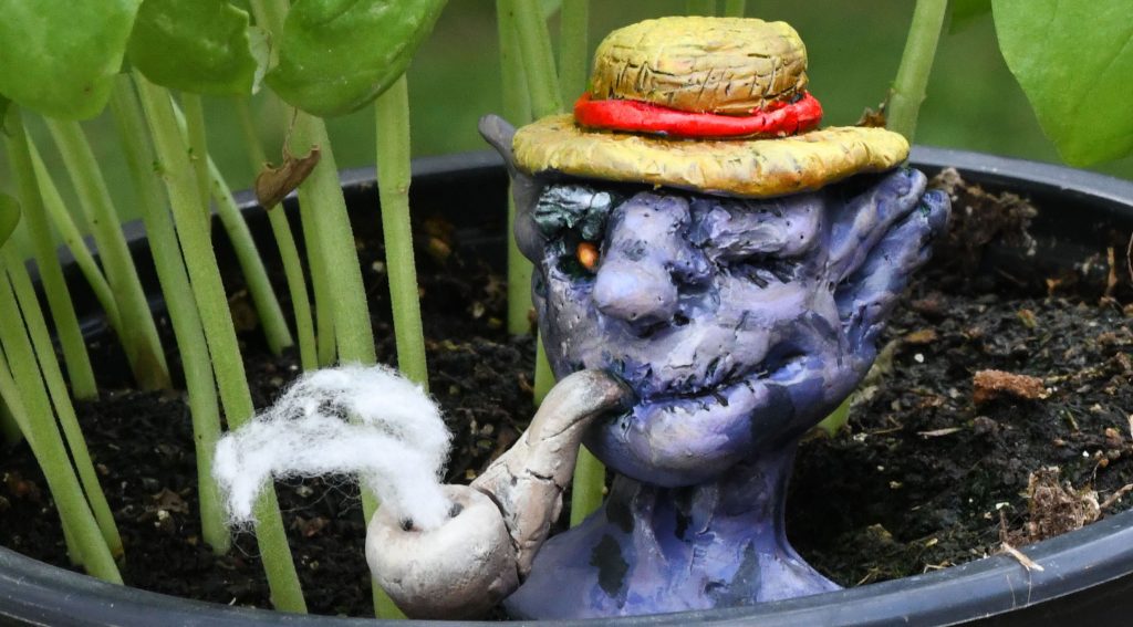 Purple goblin sculpture that links to sculptures subpage